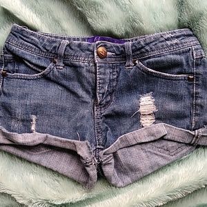 Miley Cyrus distressed Jean shorts